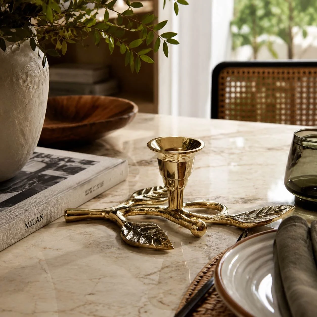 Branch candlestick styled on a dining table