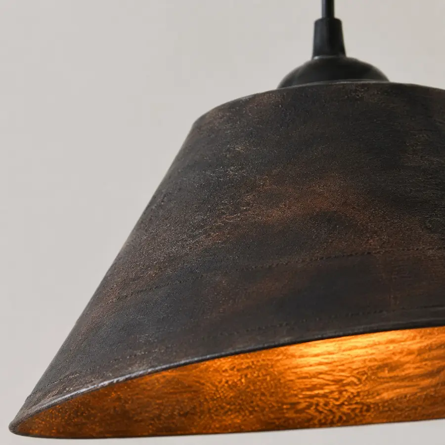 close view of the pendant shade edge and wood texture