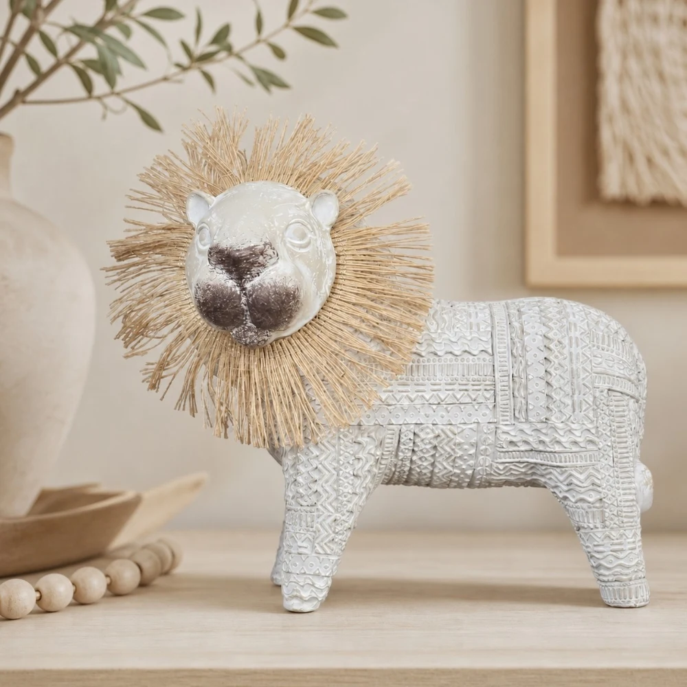 Resin lion ornament styled on a neutral tabletop shelf