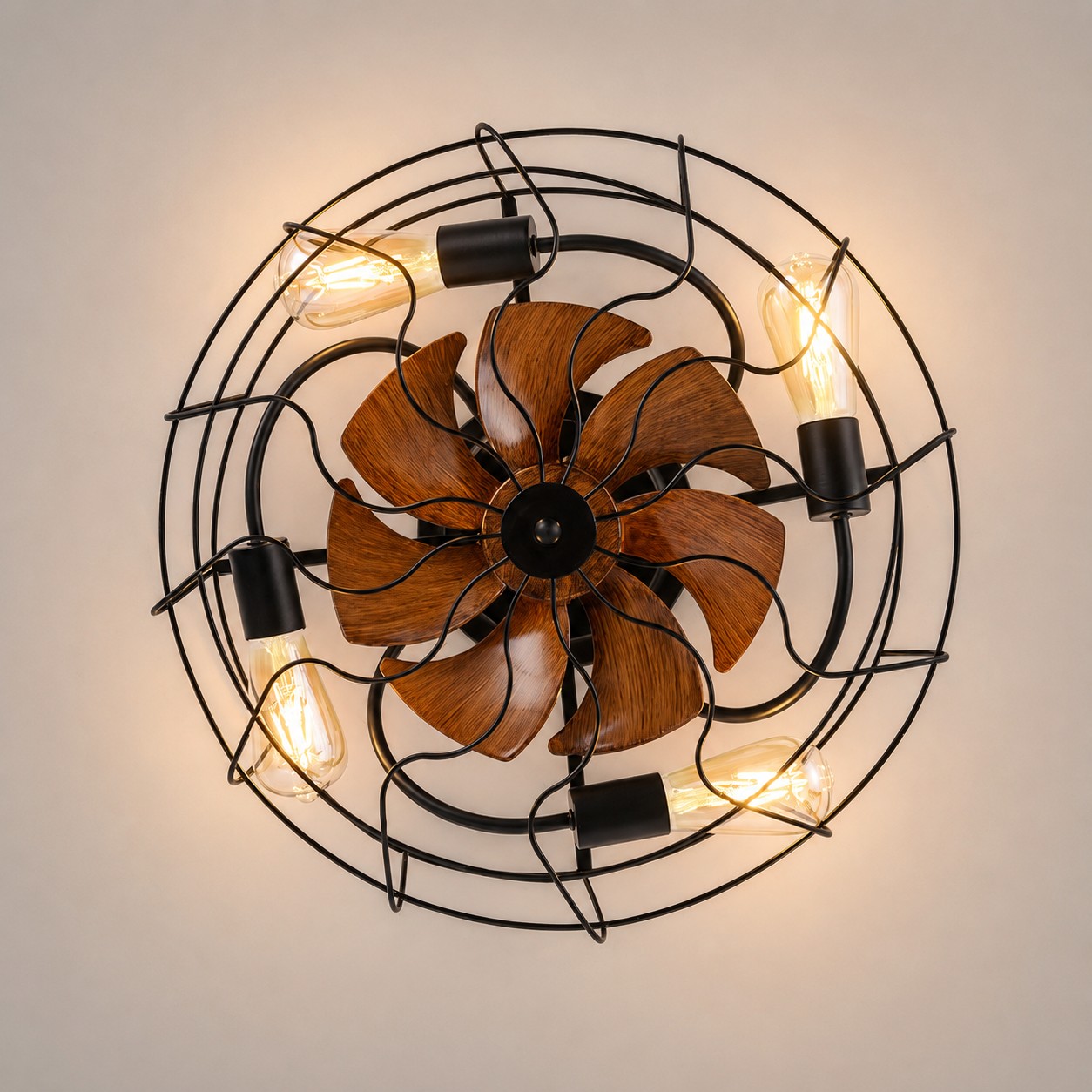 Top detail of caged ceiling fan light with warm bulbs