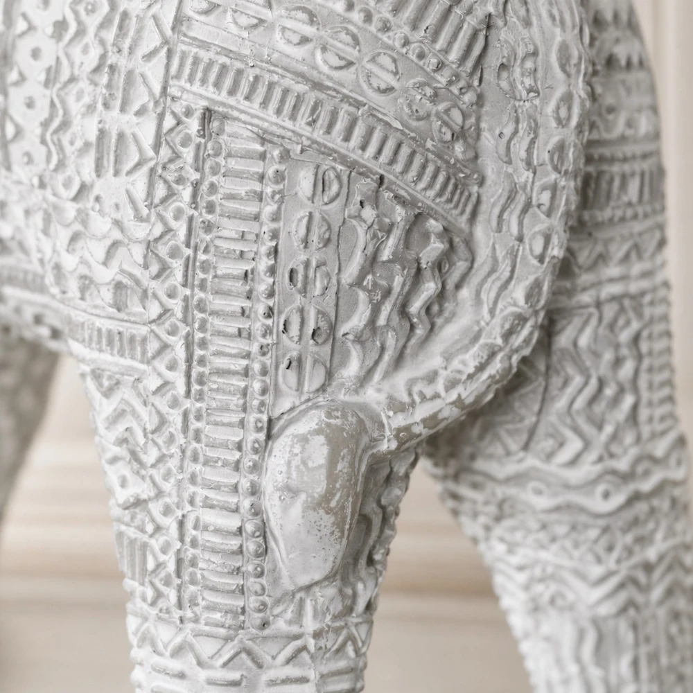 Close detail of the handmade resin lion ornament finish