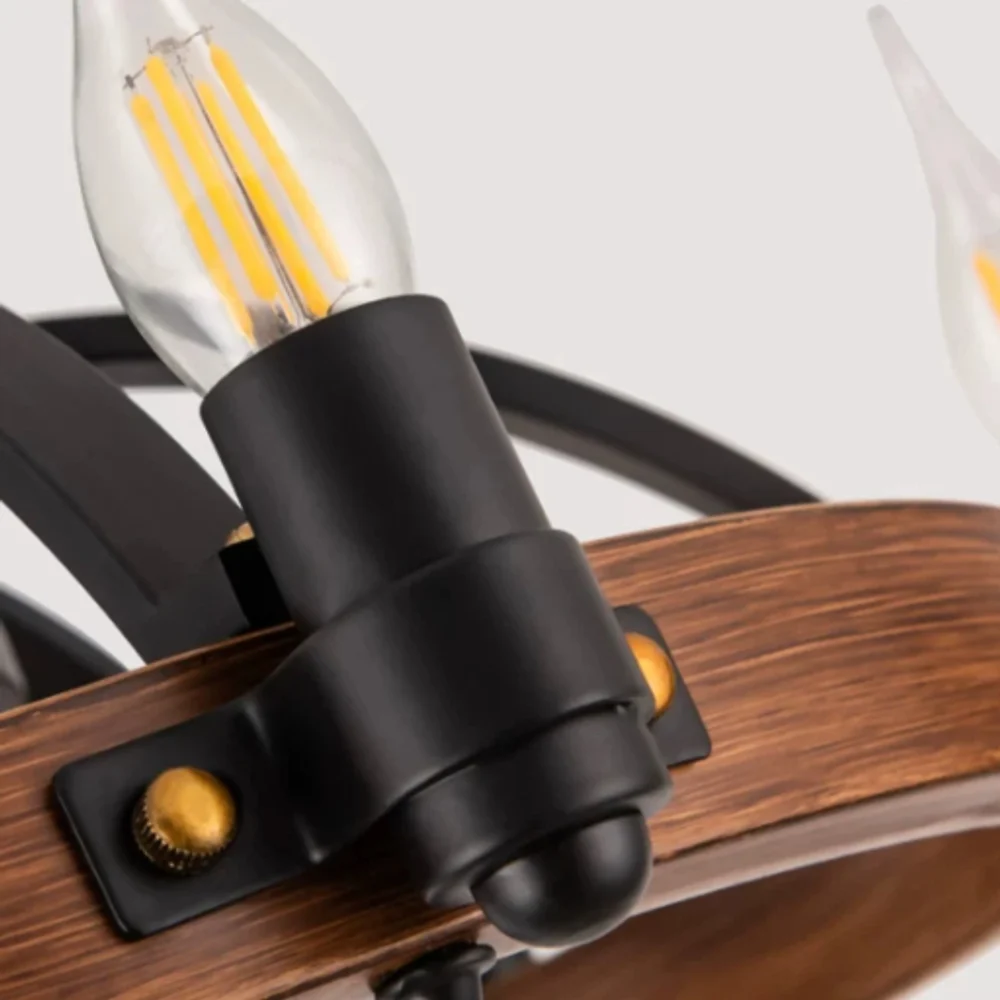 Close view of black candelabra bulb holder and gold accent