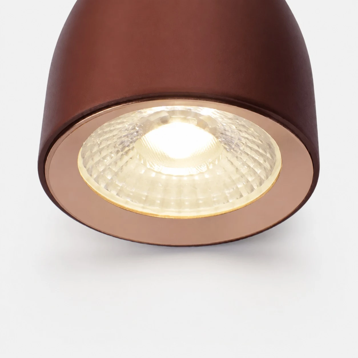 Warm illuminated lamp shade close-up