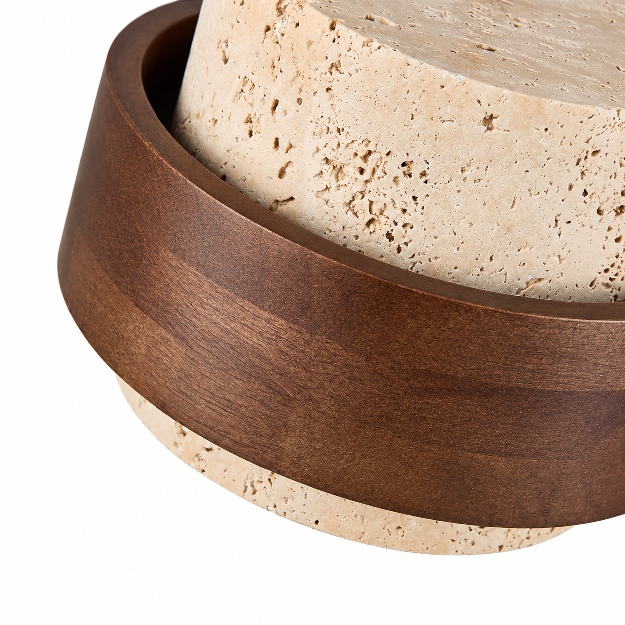 Walnut wood grain wrapping a pitted beige travertine drum