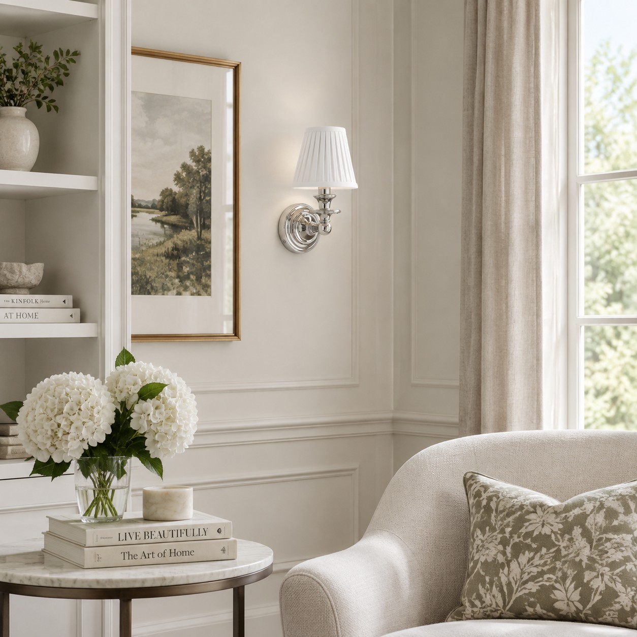 A white pleated Wren above a hydrangea and a pale chair