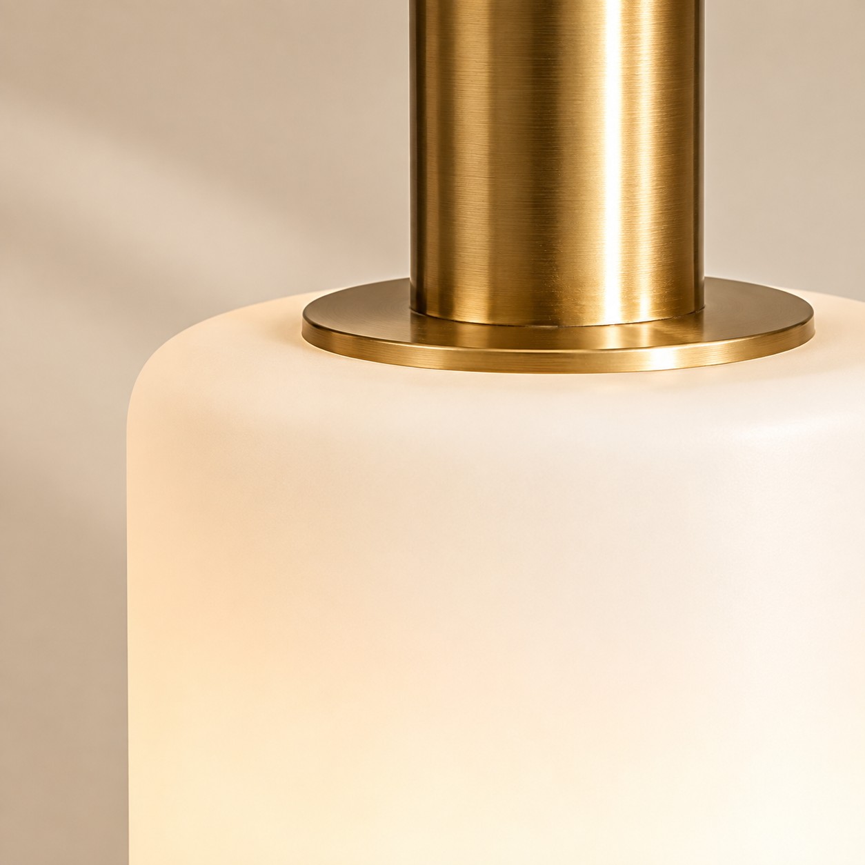 Brass disc seated on the glowing ivory porcelain cup