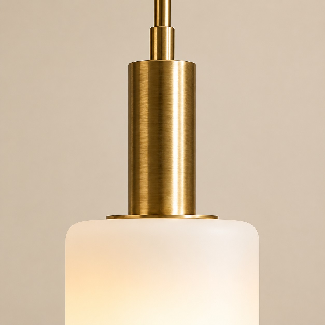 Brushed brass stem and collar above the 5 inch porcelain cup